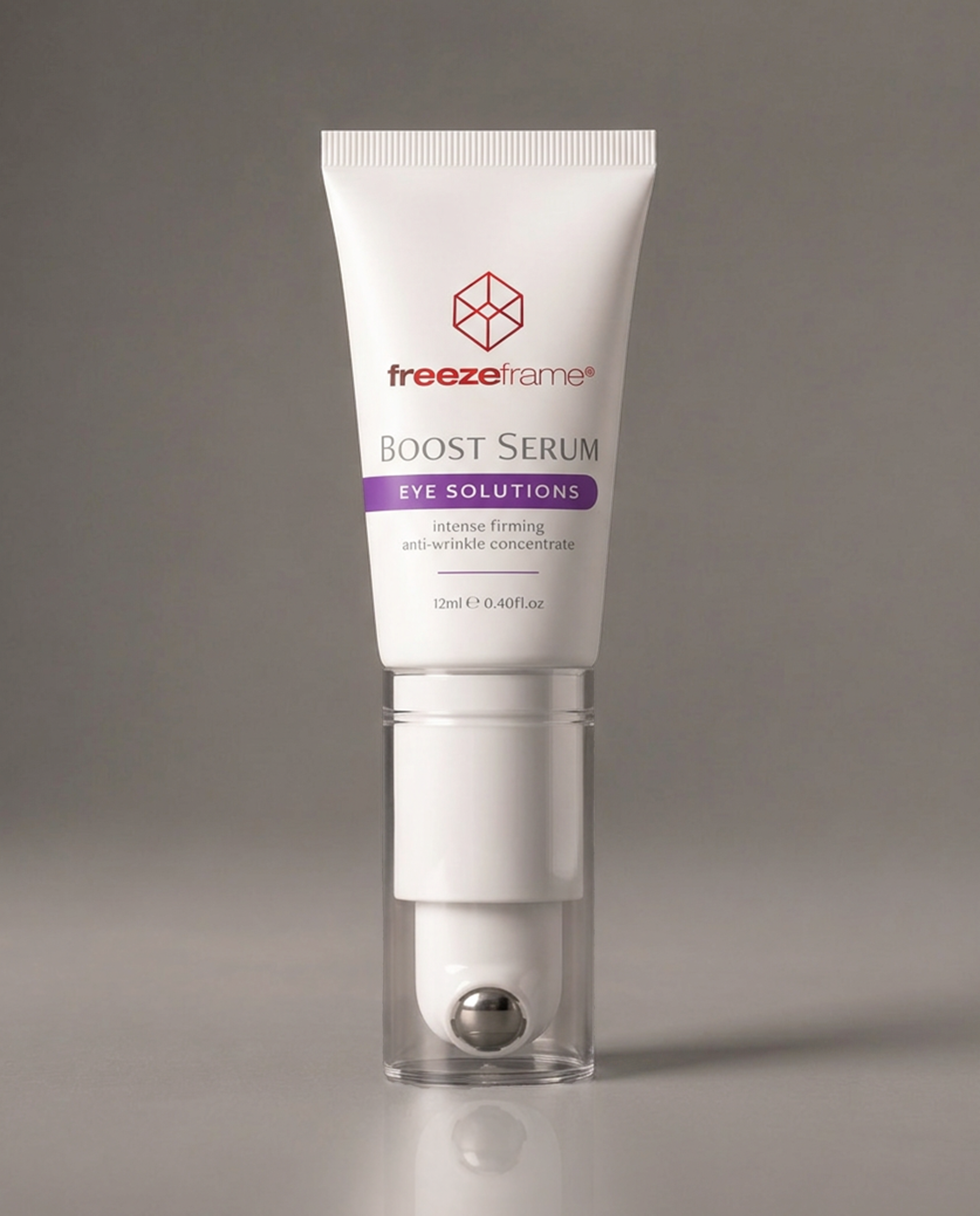 freezeframe BOOST SERUM 12ml intensive firming anti-wrinkle eye serum in a white tube with a metal rollerball applicator, designed to target fine lines, wrinkles and loss of firmness around the eyes.