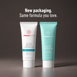 freezeframe BREAST ENHANCER original white and new turquoise 100ml packaging shown side by side, highlighting the updated design with the same breast firming and enhancing cream formula.
