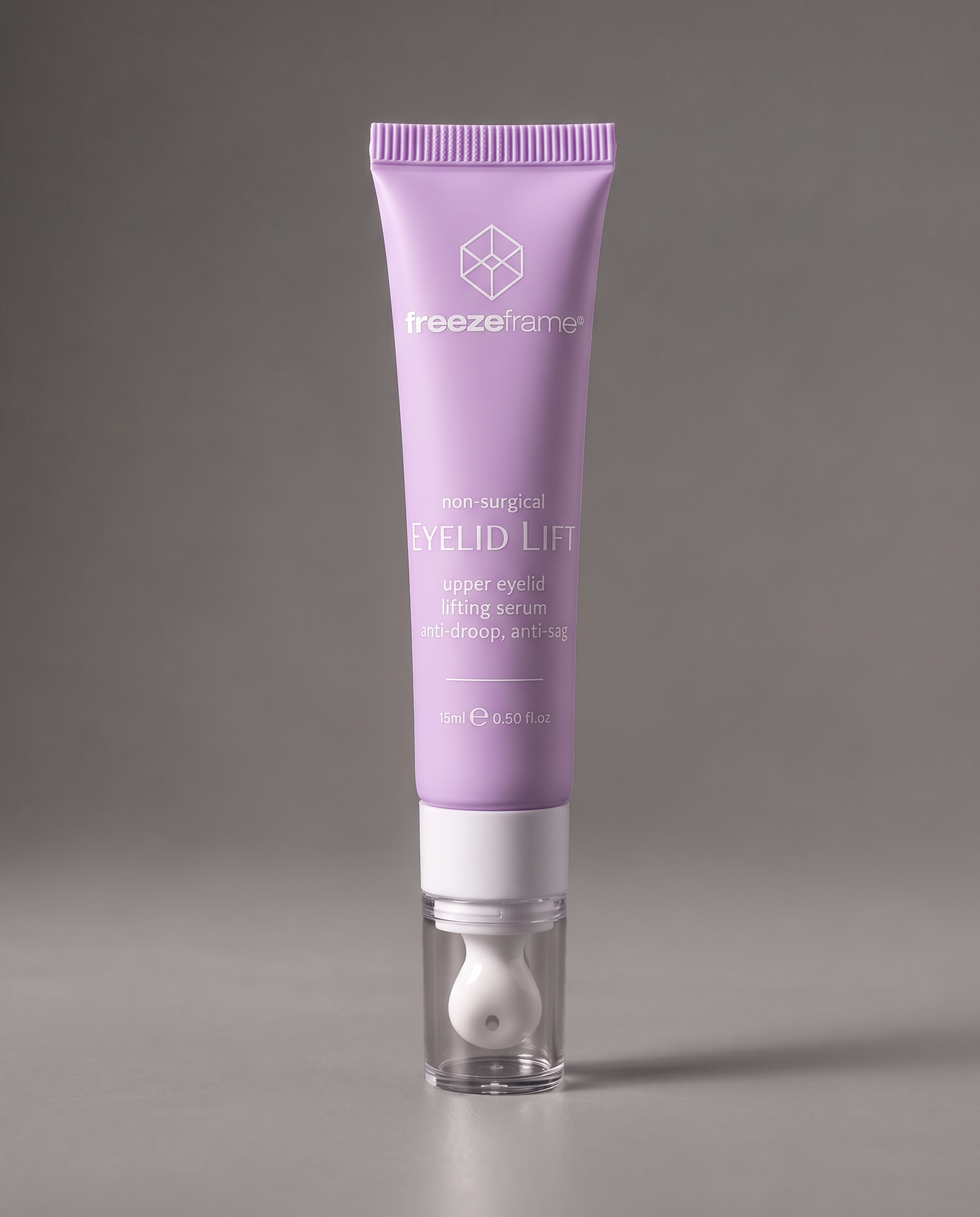 freezeframe EYELID LIFT 15ml non-surgical upper eyelid lifting serum in purple packaging with cooling ceramic applicator, designed to visibly lift, firm and tighten the appearance of drooping and sagging upper eyelids.