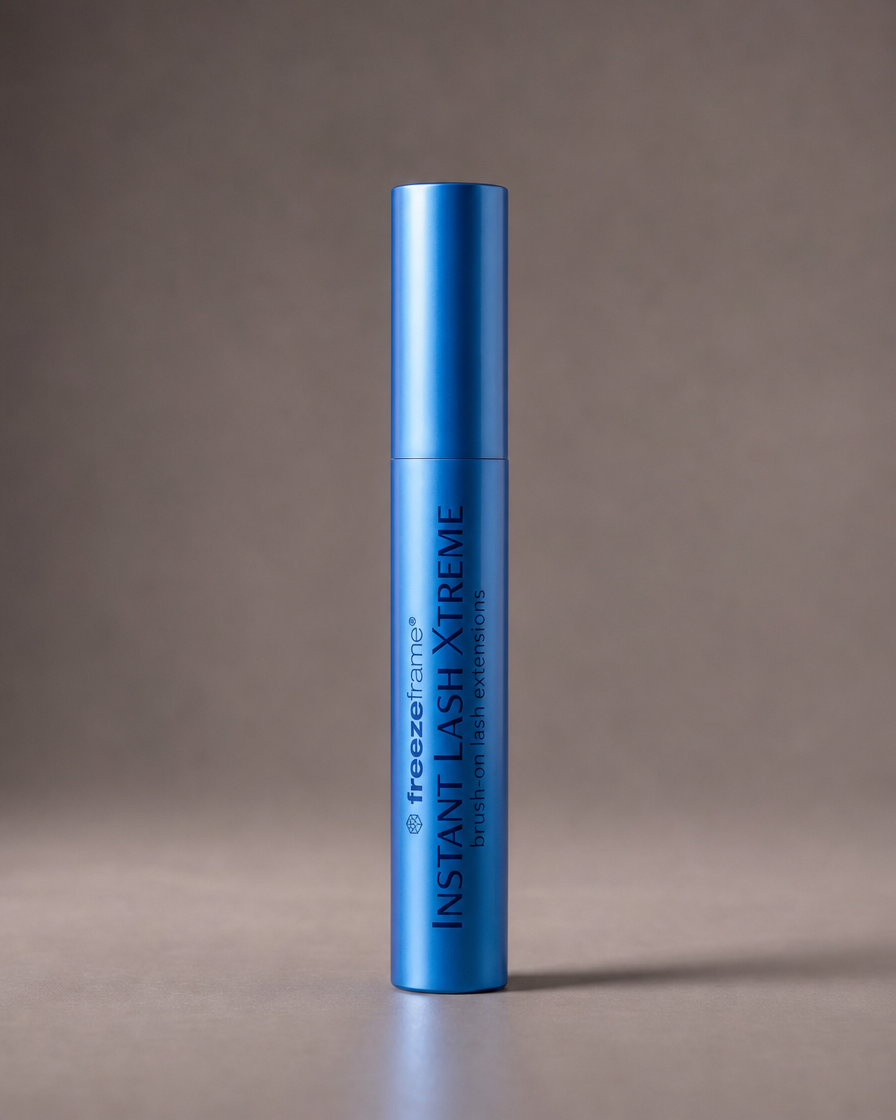 freezeframe INSTANT LASH XTREME brush-on lash extensions in metallic blue packaging, designed to create the appearance of longer, fuller, more voluminous eyelashes.