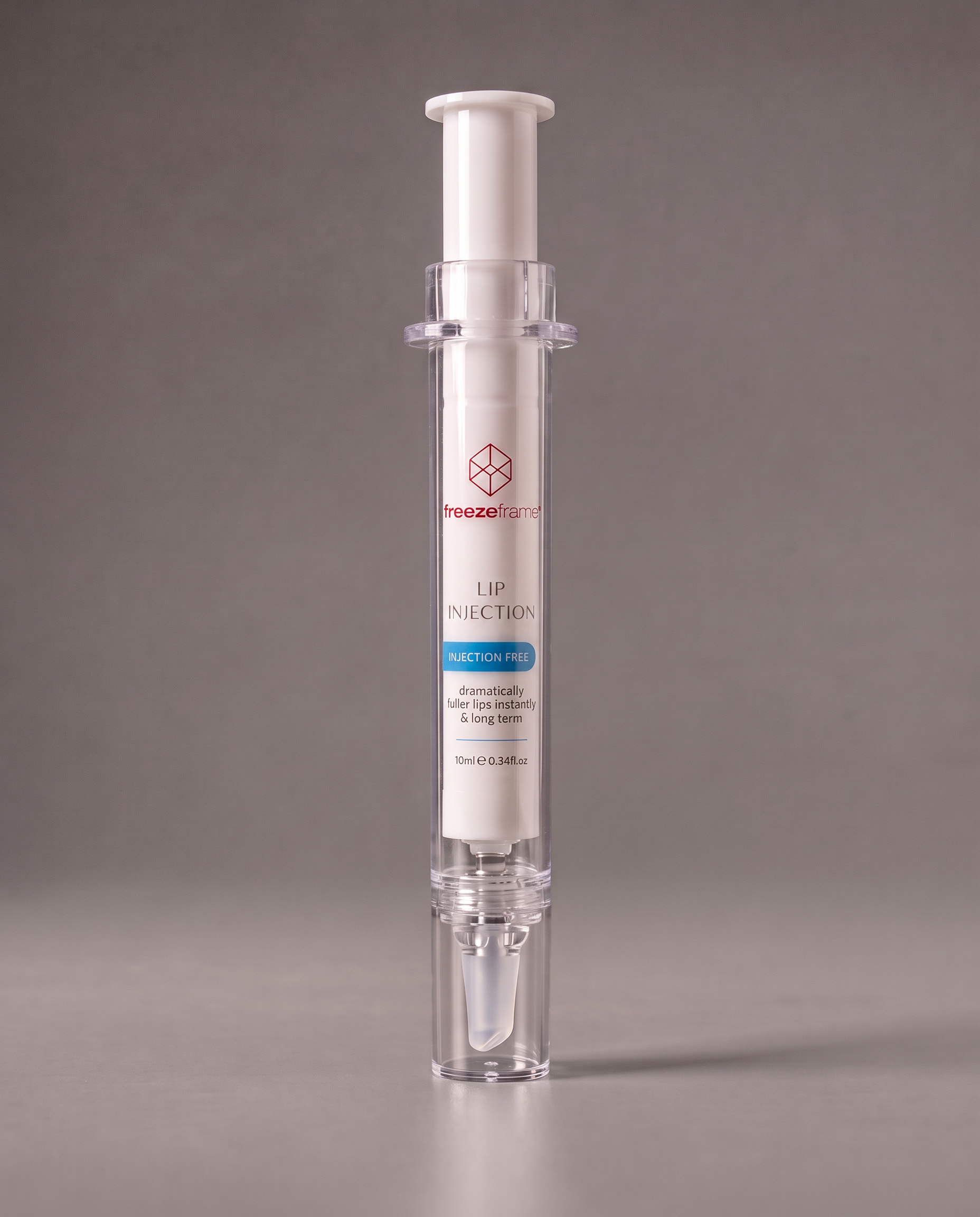 freezeframe LIP INJECTION 10ml needle-free lip plumping treatment in syringe-style packaging with precision applicator, designed for instantly fuller-looking lips and long-term plumping benefits.