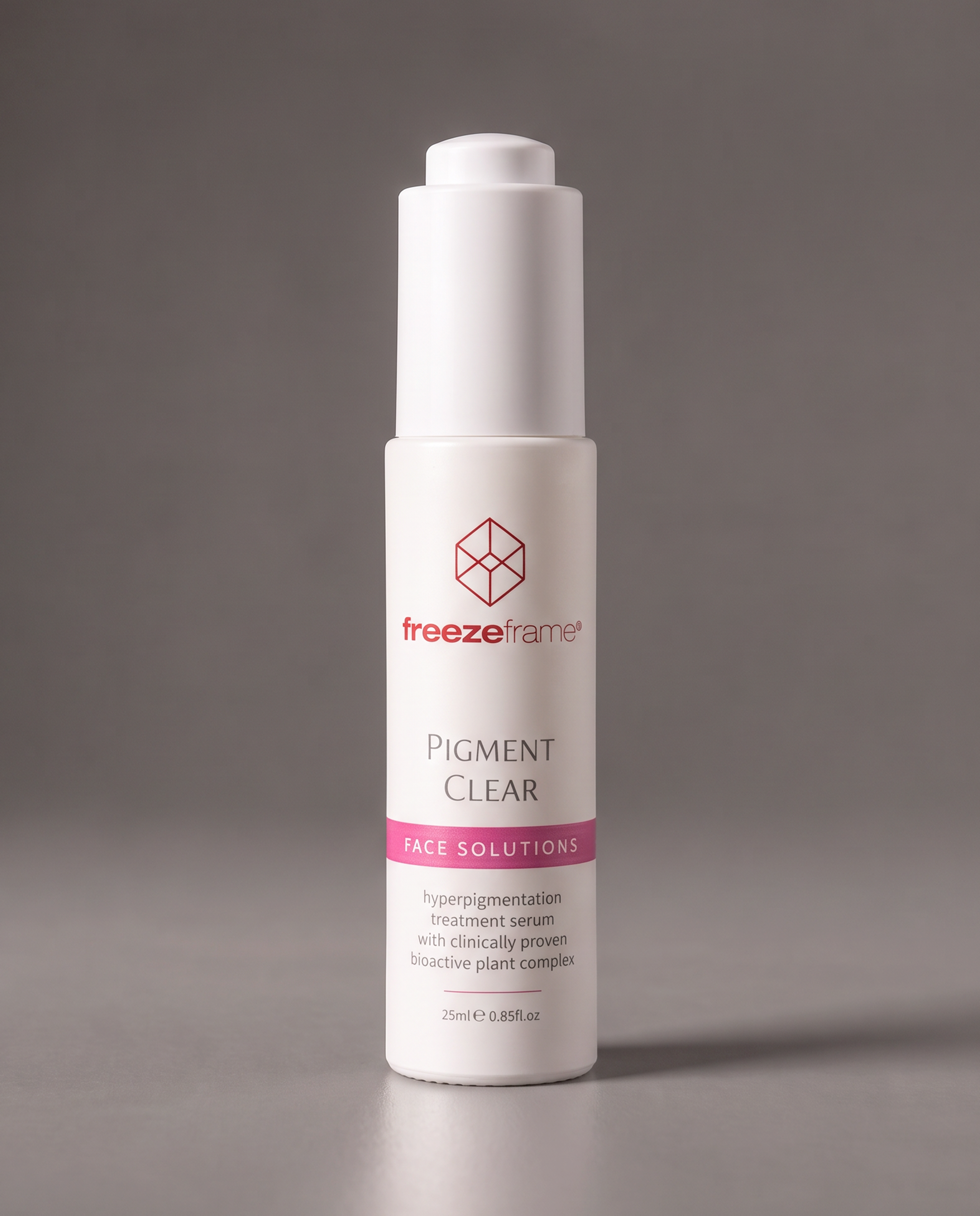 freezeframe PIGMENT CLEAR 25ml hyperpigmentation treatment serum in a white pump bottle, formulated with a bioactive plant complex to target dark spots, uneven skin tone and pigmentation.